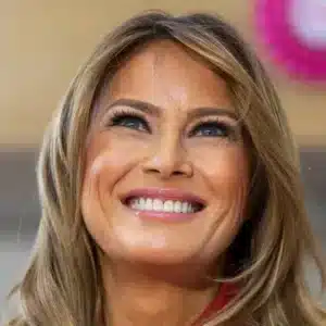 Melania Trump Embraces Holiday Spirit While Receiving White House Christmas Tree in Style